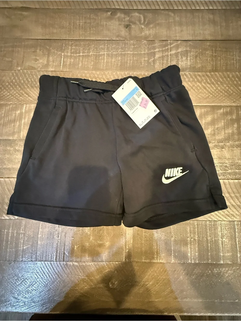 Nike girl’s Black Athletic Shorts with White Logo
